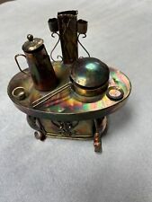 Vintage Copper Tone Tin Wood Stove Music Box Plays “Oh, What A Beautiful Morning picture