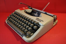 Vintage Olympia Splendid 33 light grey typewriter in very good working condition picture