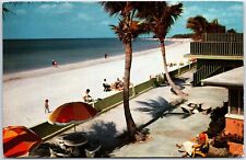 VINTAGE POSTCARD WHIET SAND BEACH PATIO SCENE AT ST. PETERSBURG FLORIDA 1970s picture