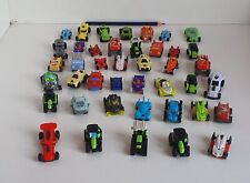 A set of 42 kinder car toys that are different from each other.  picture