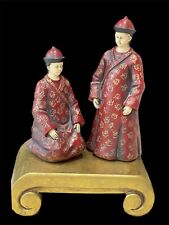 Pair Of Chinese Figures Sitting On Gilded Scroll picture