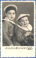 Portrait of a girl and a boy in a photo studio Evpatoria Vintage photo picture