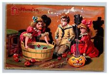 Postcard Halloween Tuck's # 150 Children Bobbing Apples Jack-o-Lantern picture