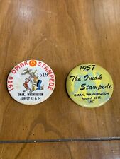 Two Vintage 1957 And 1961 The Omak Stampede Omak, Washington Pin Back Buttons picture