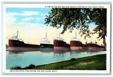 c1920's Big Ore & Grain Carriers Great Lakes Awaiting Their Turn Soo MI Postcard picture