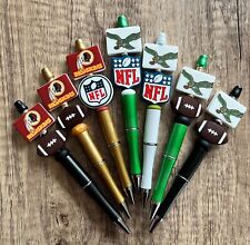 Football pens NFL throwback logos. Eagles & Redskins.Gift.basket filler.collect picture