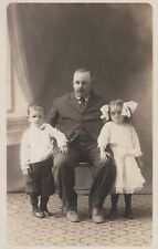Little Children And Father Big Bows In Hair Vintage Real Photo RPPC Post Card picture