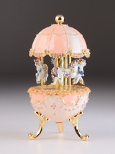 Keren Kopal Pink Carousel Egg with Royal Horses Decorated with Austrian Crystals picture