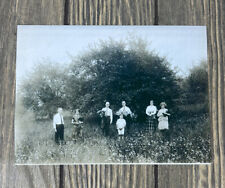 Vintage Black And White 7 People In Flower Greenery Field Photo Reprint 6 5/8”  picture