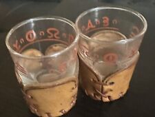 2Western Shot Glasses With Leather Sleeves And Brands On The Glass ￼ picture