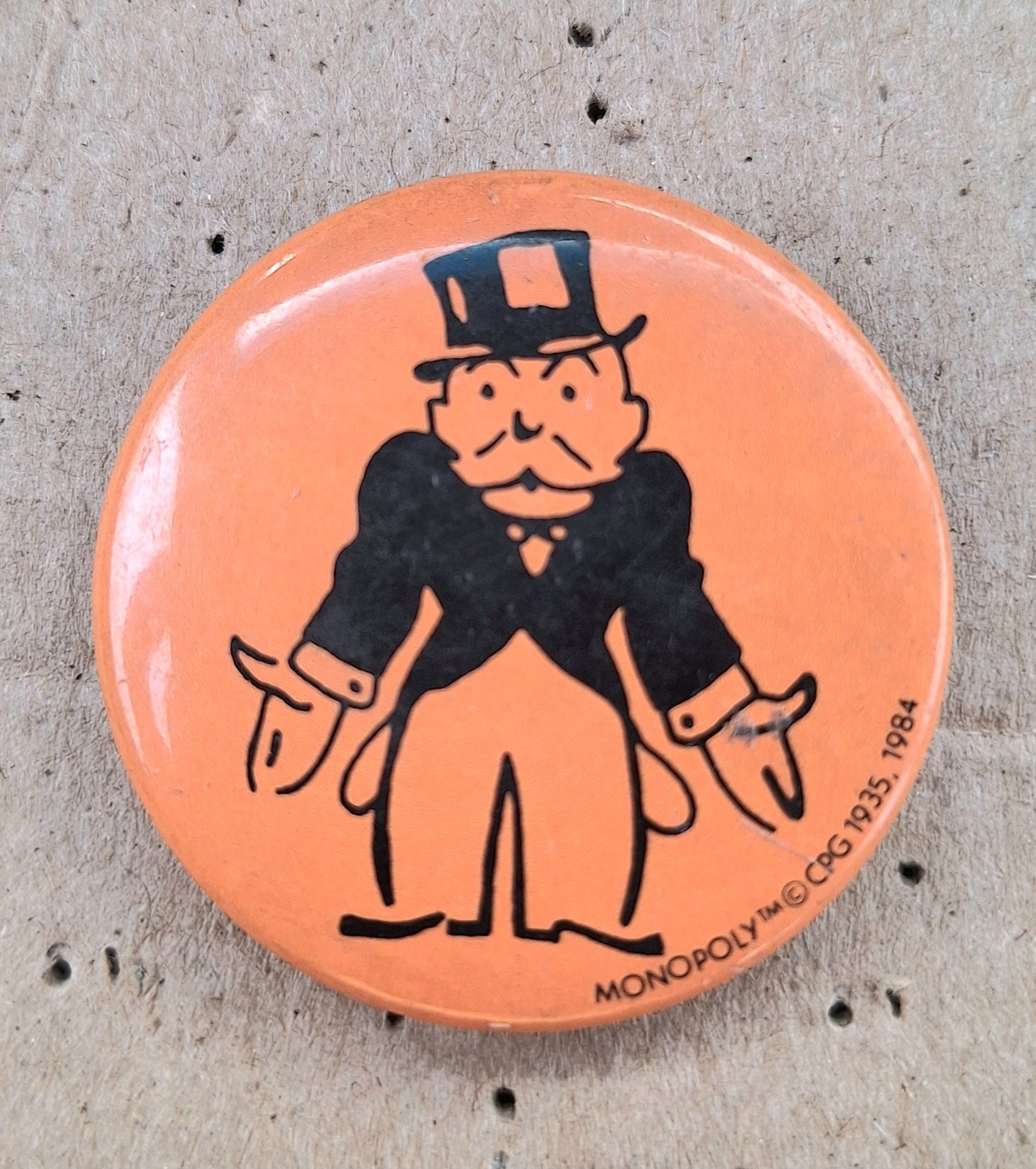 Vintage 1984 American Greetings Pin Back Button Monopoly Game Orange Vintage 1984 American Greetings Pin Back Button Monopoly Game Orange