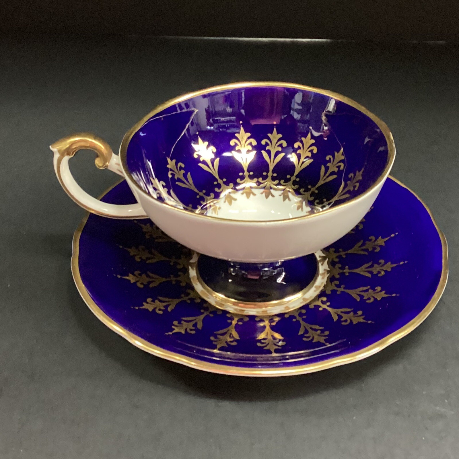 Scarce Cobalt Blue Aynsley Footed teacup and saucer set bone China UK gold gilt Scarce Cobalt Blue Aynsley Footed teacup and saucer set bone China UK gold gilt