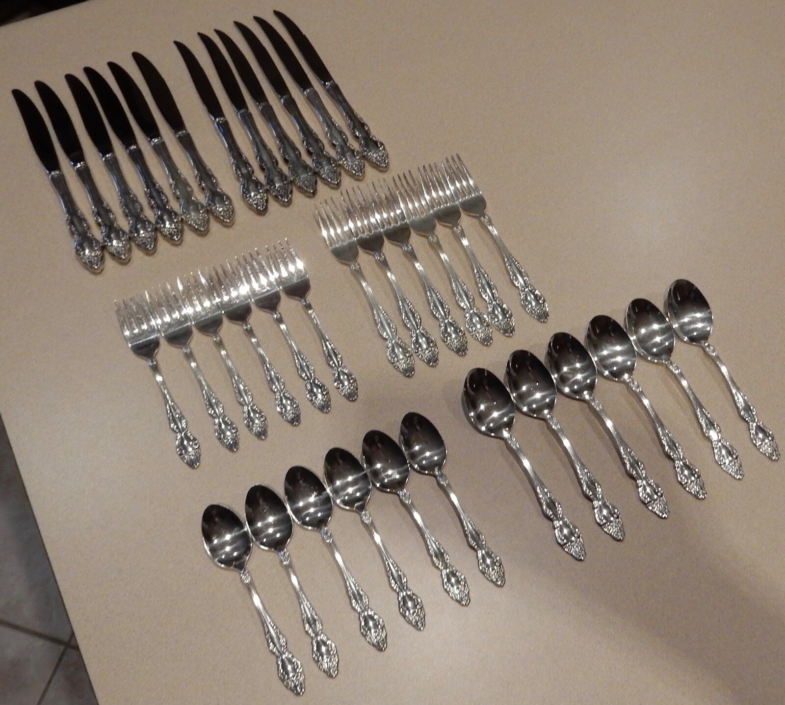 Vintage 1881 Rogers Oneida Silverplate Flatware Baroque Rose 36 PC Vintage 1881 Rogers Oneida Silverplate Flatware Baroque Rose 36 PC