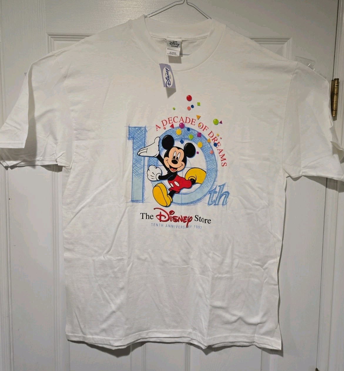 Vintage 1997 Disney The Disney Store 10th Anniversary White T-Shirt XL NWT Vintage 1997 Disney The Disney Store 10th Anniversary White T-Shirt XL NWT