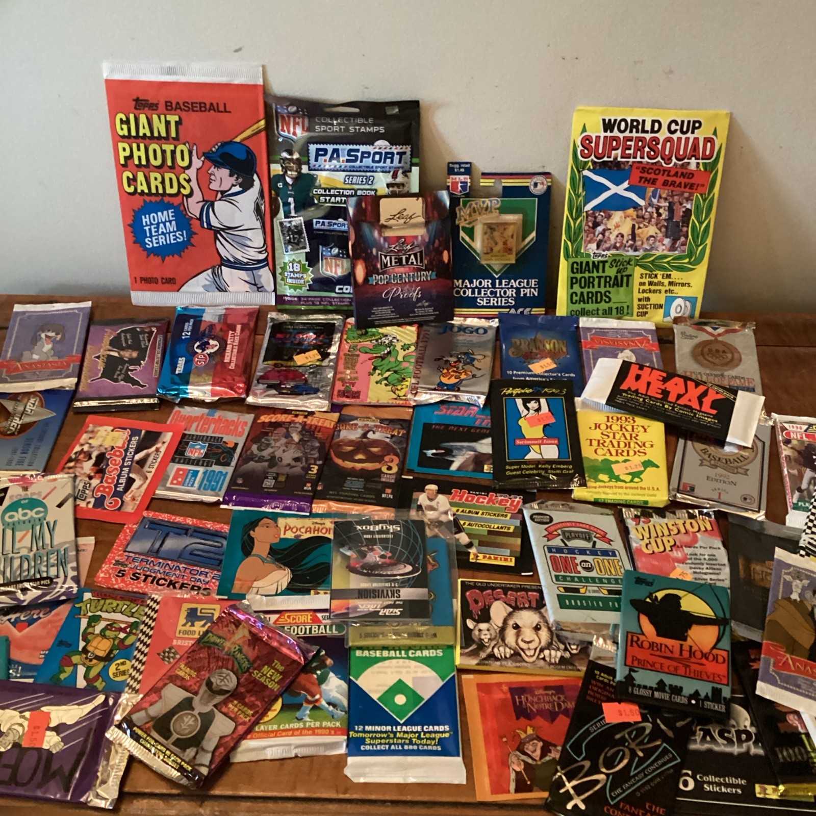 Lot of 50 Diff Random Unopened  Packs Sport & Non Sport with 1 LEAF METAL proof