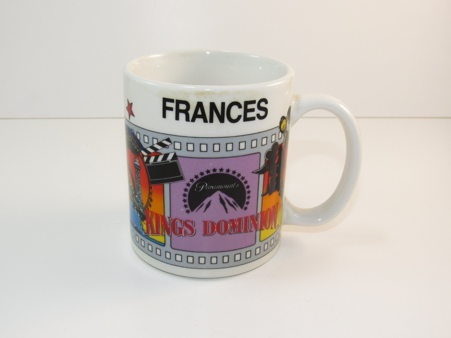 Vintage Kings Dominion Ceramic Mug White 12oz Movie Strip Design Vintage Kings Dominion Ceramic Mug White 12oz Movie Strip Design