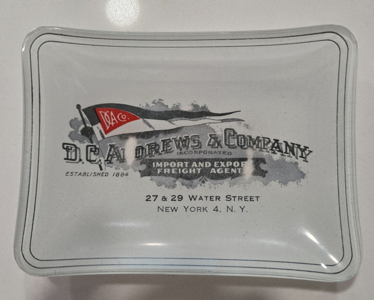 Vintage D C Andrews & Co Desktop Ashtray - has company logo and name on white bk
