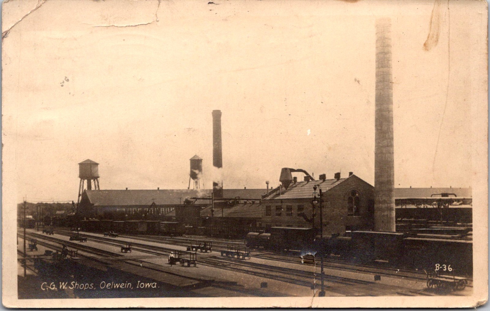 Real Photo Postcard C G W Railroad Shops, Oelwein, Iowa - used in 1910 Real Photo Postcard C G W Railroad Shops, Oelwein, Iowa - used in 1910