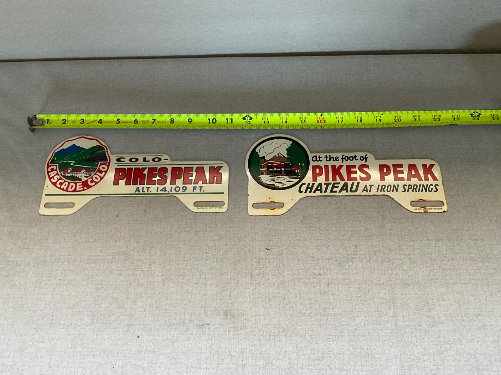 Two vintage pikes peak sign plate license topper Colorado