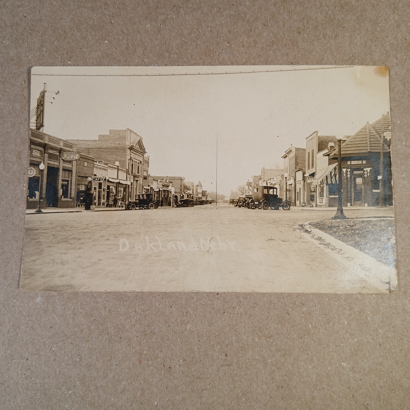 RPPC Oakland Nebraska Main Street Circa 1920's Postcard Ford Motors Cars RPPC Oakland Nebraska Main Street Circa 1920's Postcard Ford Motors Cars