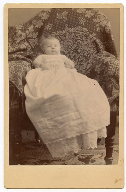 Original Cabinet Photo - Young Baby Propped in Chair Wearing Long Gown Original Cabinet Photo - Young Baby Propped in Chair Wearing Long Gown