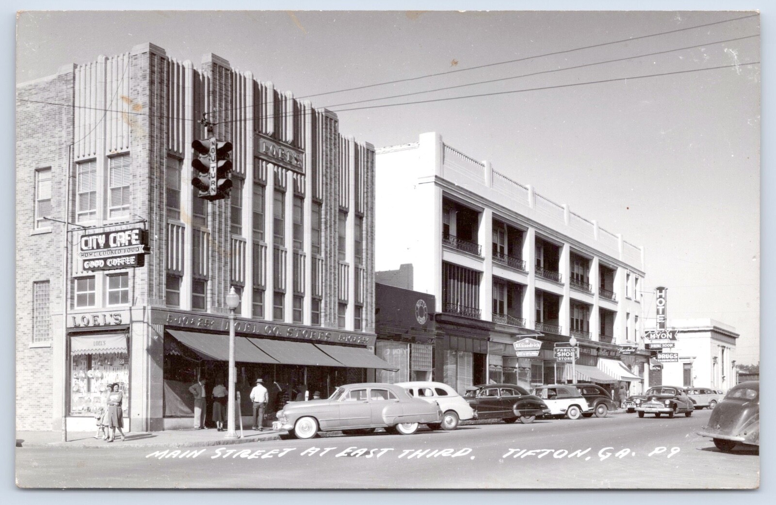 Tiffton, Georgia GA Main Street View Old Cars Loel\'s Cafe RPPC c1940s Postcard Tiffton, Georgia GA Main Street View Old Cars Loel\'s Cafe RPPC c1940s Postcard