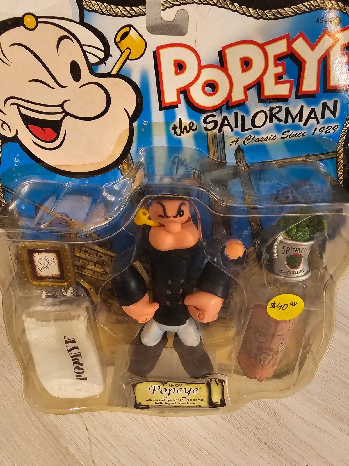 POPEYE PEA COAT FIGURE W/ SPINACH CAN, TREASURE MAP DUFFLE BAG AND PICTURE FRAME POPEYE PEA COAT FIGURE W/ SPINACH CAN, TREASURE MAP DUFFLE BAG AND PICTURE FRAME