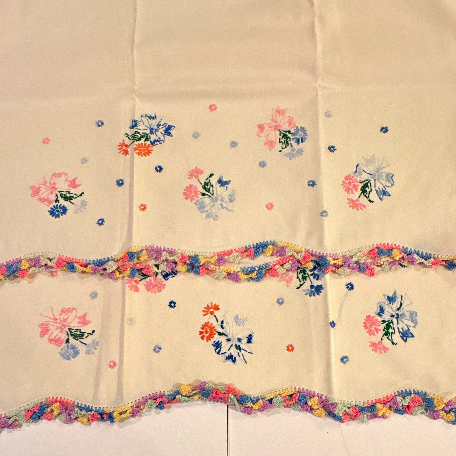 Beautiful Vintage hand embroidered pillow cases with crochet bottom edging. Beautiful Vintage hand embroidered pillow cases with crochet bottom edging.