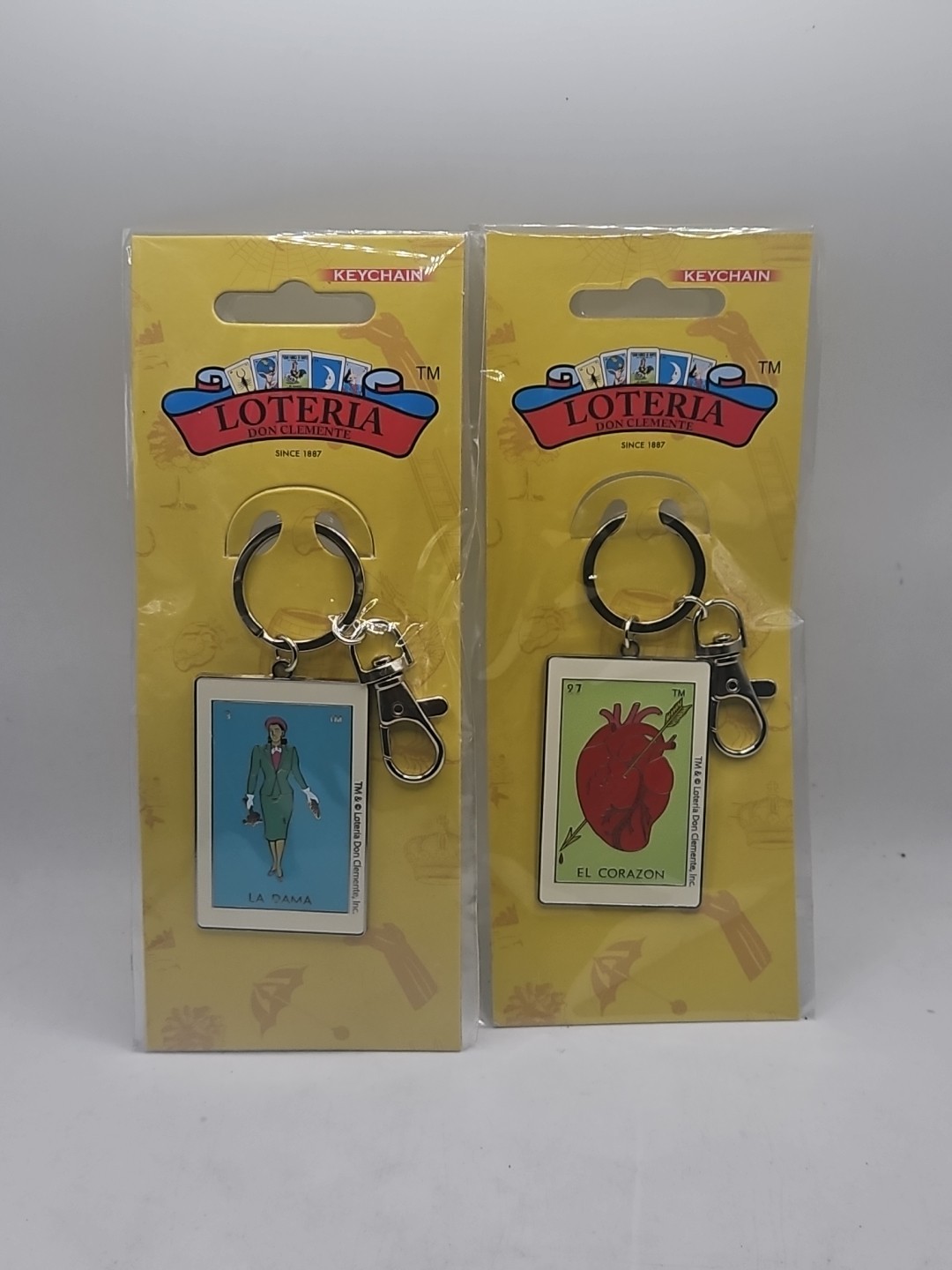 La Loteria La Dama & El Corazon Metal Keychains La Loteria La Dama & El Corazon Metal Keychains