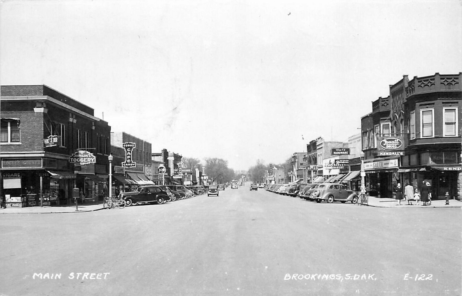 1950 Brookings South Dakota Main Street autos RPPC Postcard 25-8019 1950 Brookings South Dakota Main Street autos RPPC Postcard 25-8019