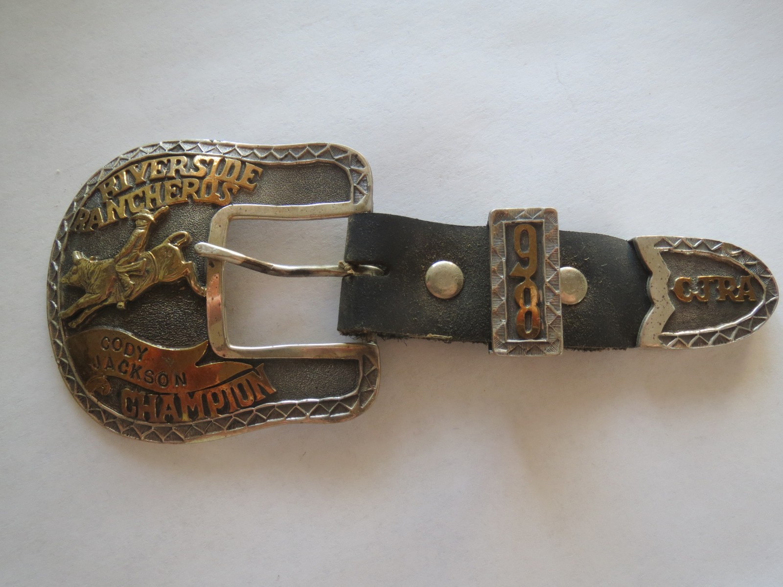 1998 CJRA Riverside Rancheros CA Bull Riding Rodeo Champion Award Belt Buckle 1998 CJRA Riverside Rancheros CA Bull Riding Rodeo Champion Award Belt Buckle