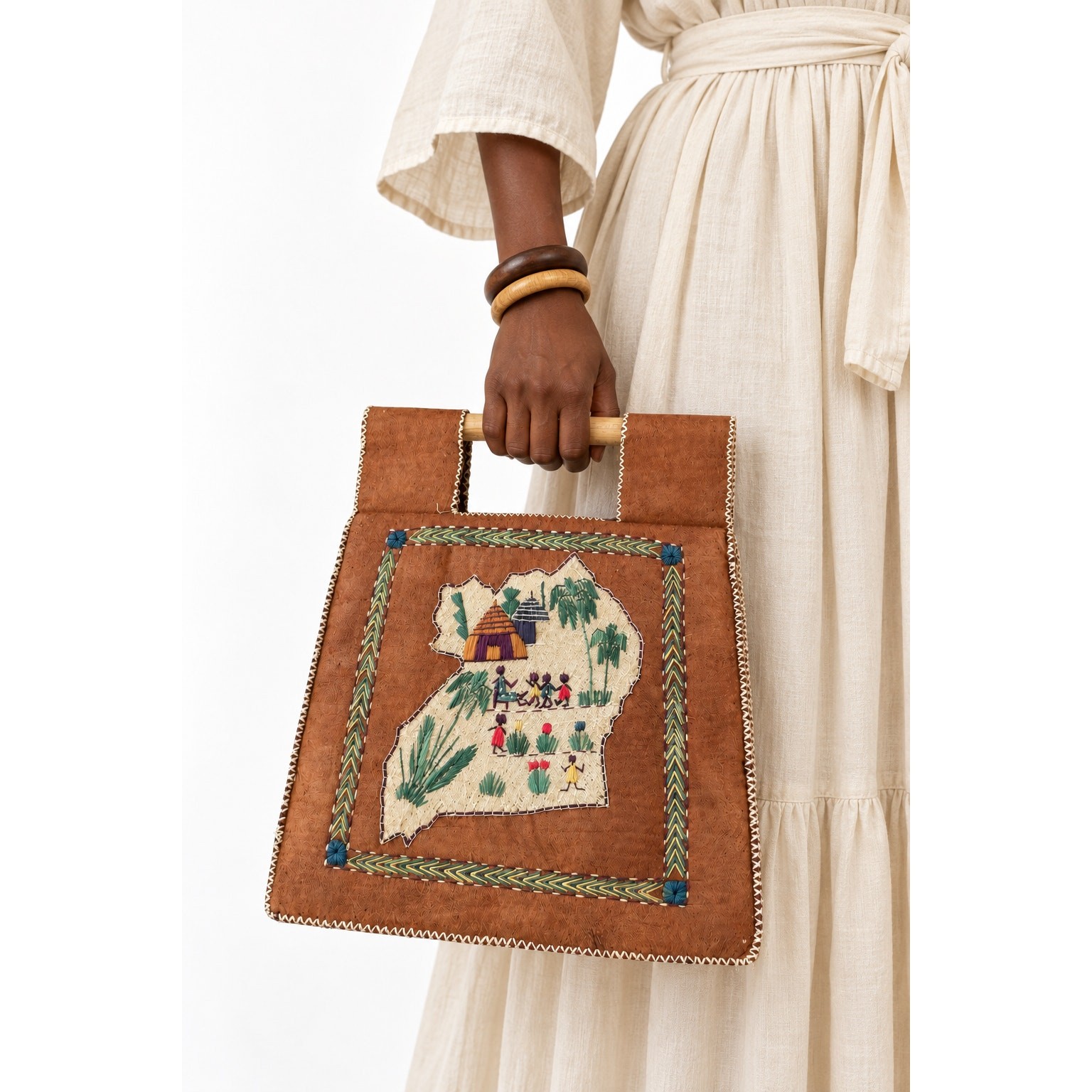 Vintage ‘60s/‘70s Handmade Ugandan Folk Art Barkcloth Raffia Cane Handle Handbag Vintage ‘60s/‘70s Handmade Ugandan Folk Art Barkcloth Raffia Cane Handle Handbag