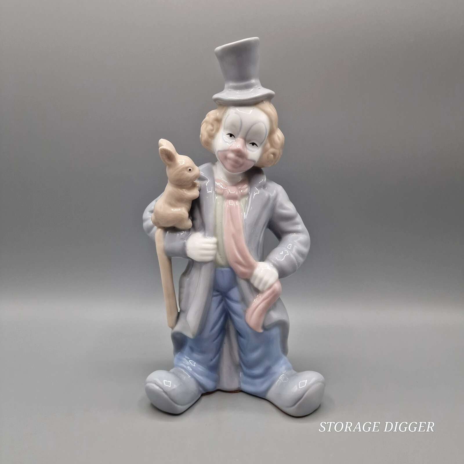 Vintage Blue Gray Brown Porcelain Clown with Rabbit Figurine 9.5\