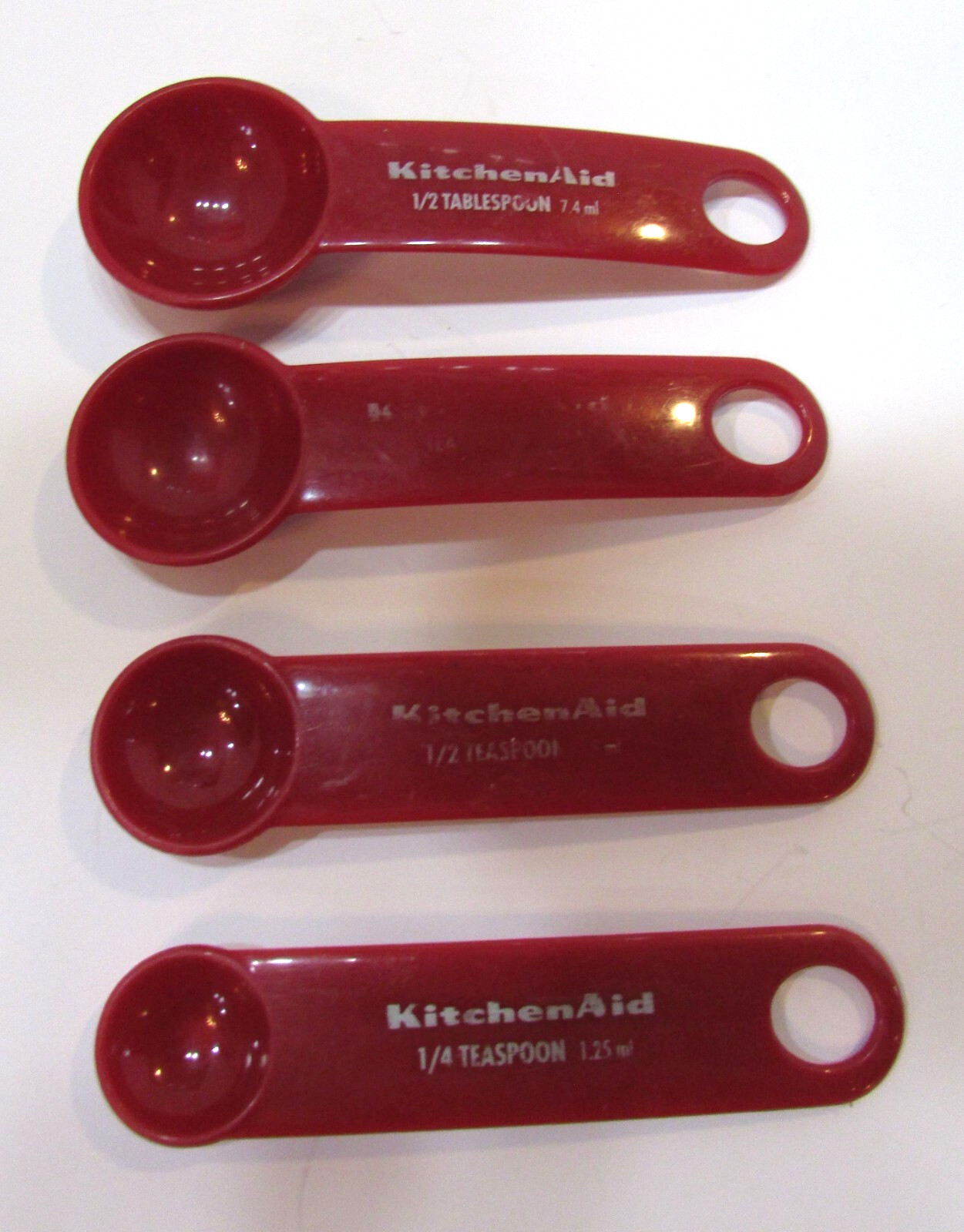 Vintage 1990's Set Four Red Plastic Kitchen Aid Brand Measuring Spoons Vintage 1990's Set Four Red Plastic Kitchen Aid Brand Measuring Spoons
