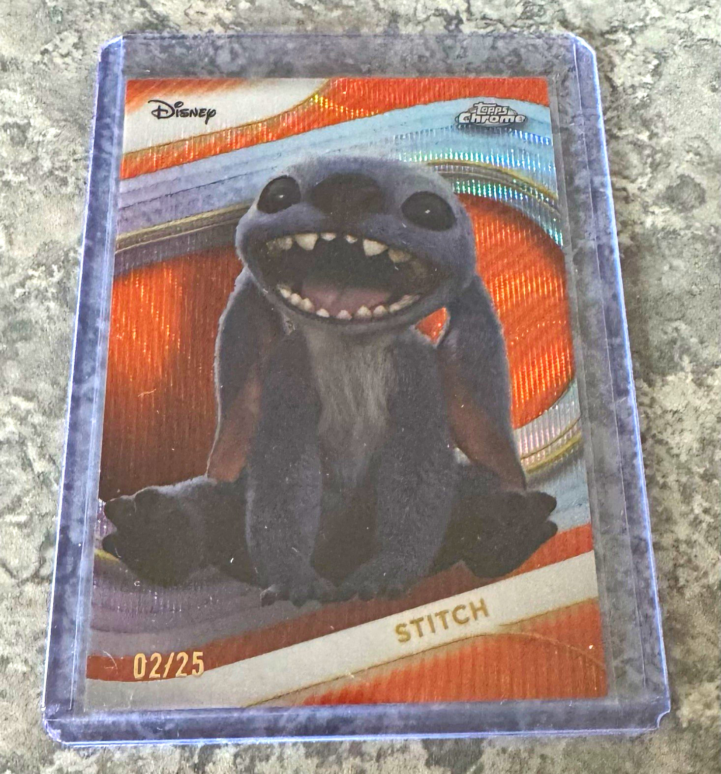 Topps 2025 Topps Chrome Disney Stitch #200 orange refractor 02/25 Topps 2025 Topps Chrome Disney Stitch #200 orange refractor 02/25