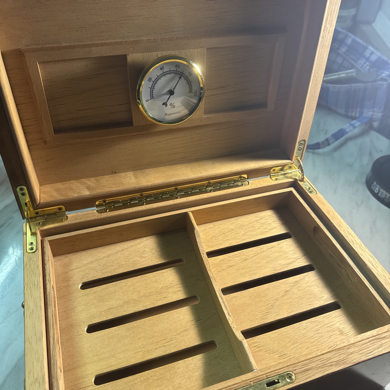 wooden desktop cigar humidor featuring an interior analog hygrometer wooden desktop cigar humidor featuring an interior analog hygrometer