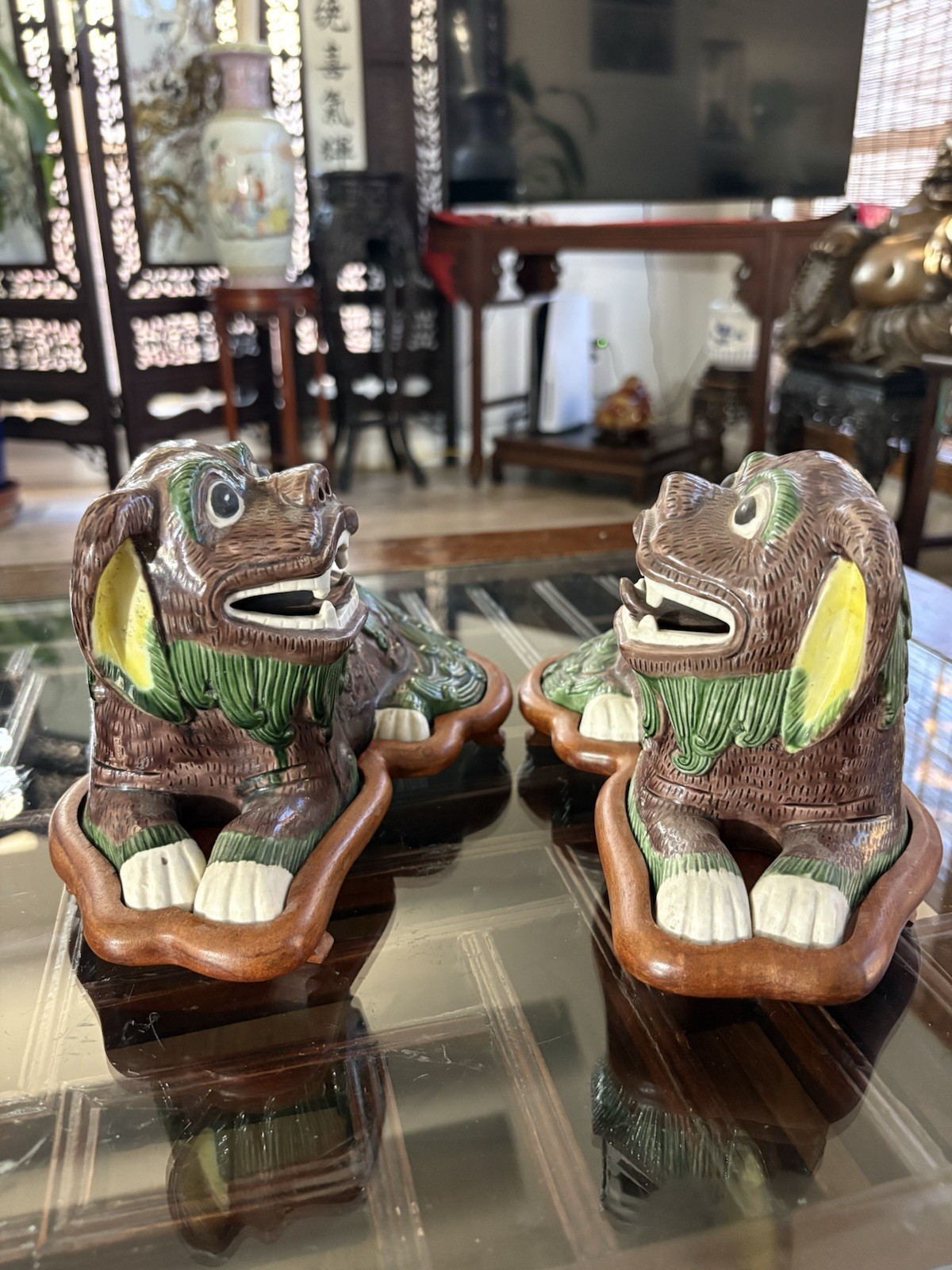 Pair Chinese Export Famille Verte Biscuit Porcelain Foo Lions, mid 20th Century Pair Chinese Export Famille Verte Biscuit Porcelain Foo Lions, mid 20th Century