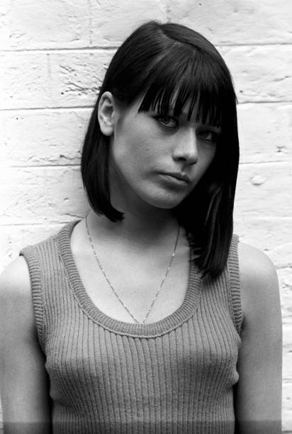 Portrait of a British young woman an asymmetric haircut launched b- Old Photo Portrait of a British young woman an asymmetric haircut launched b- Old Photo