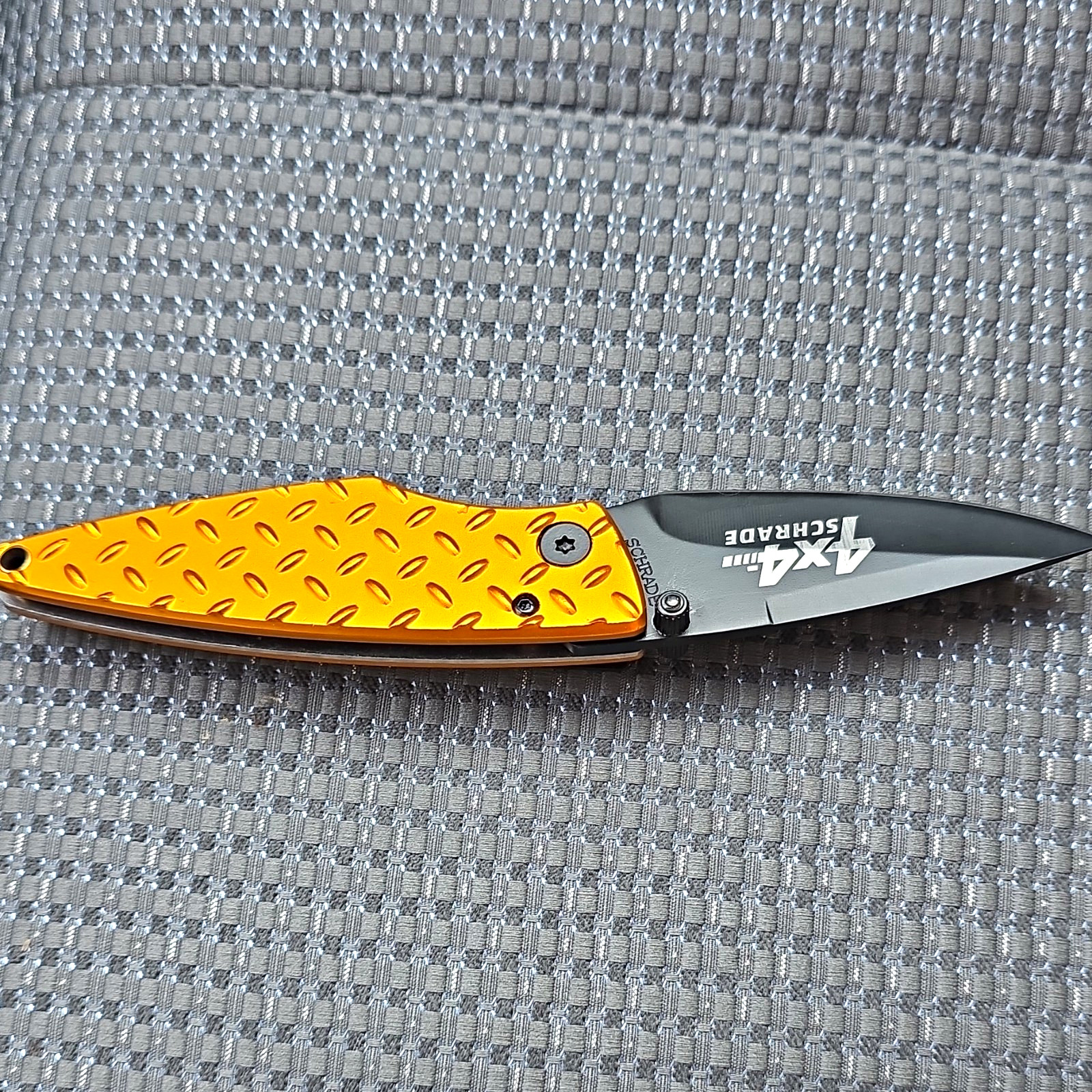 Schrade 4x4 Orange/Black Aluminum Handle SS Plain Drop Point Liner Clip Schrade 4x4 Orange/Black Aluminum Handle SS Plain Drop Point Liner Clip