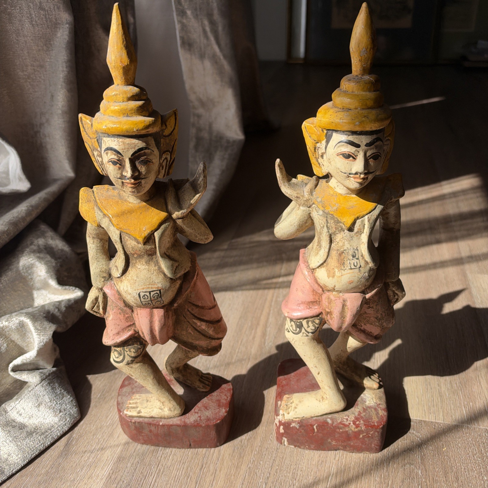 A Pair of Carved Wooden Figures (Likely A Burmese Nat Spirit Or A Celestial Sun) A Pair of Carved Wooden Figures (Likely A Burmese Nat Spirit Or A Celestial Sun)