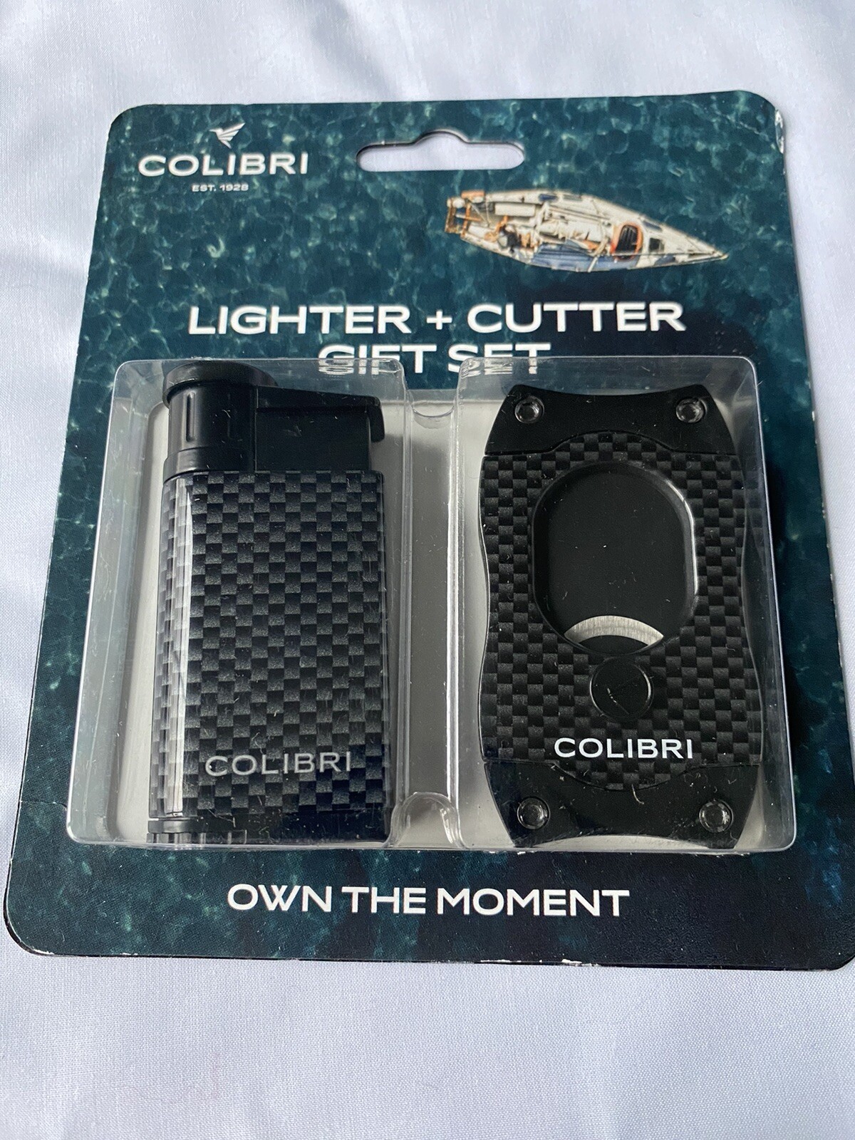 Colibri EVO Lighter and S-Cut Cigar Cutter Gift Set - Black Carbon Fiber Finish Colibri EVO Lighter and S-Cut Cigar Cutter Gift Set - Black Carbon Fiber Finish