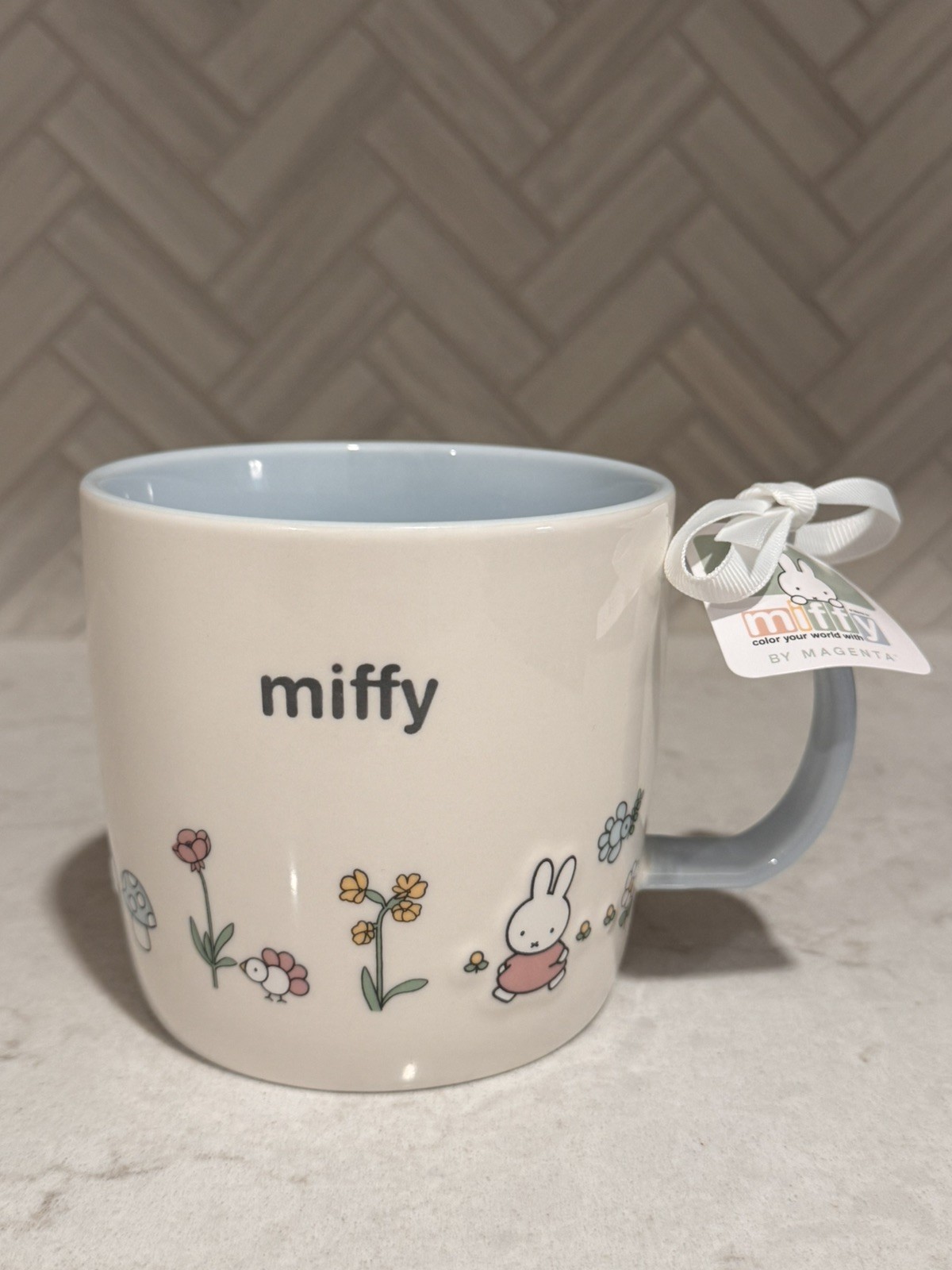 Brand New Miffy by Magenta Floral Mug Blue & White, 18 oz. Brand New Miffy by Magenta Floral Mug Blue & White, 18 oz.