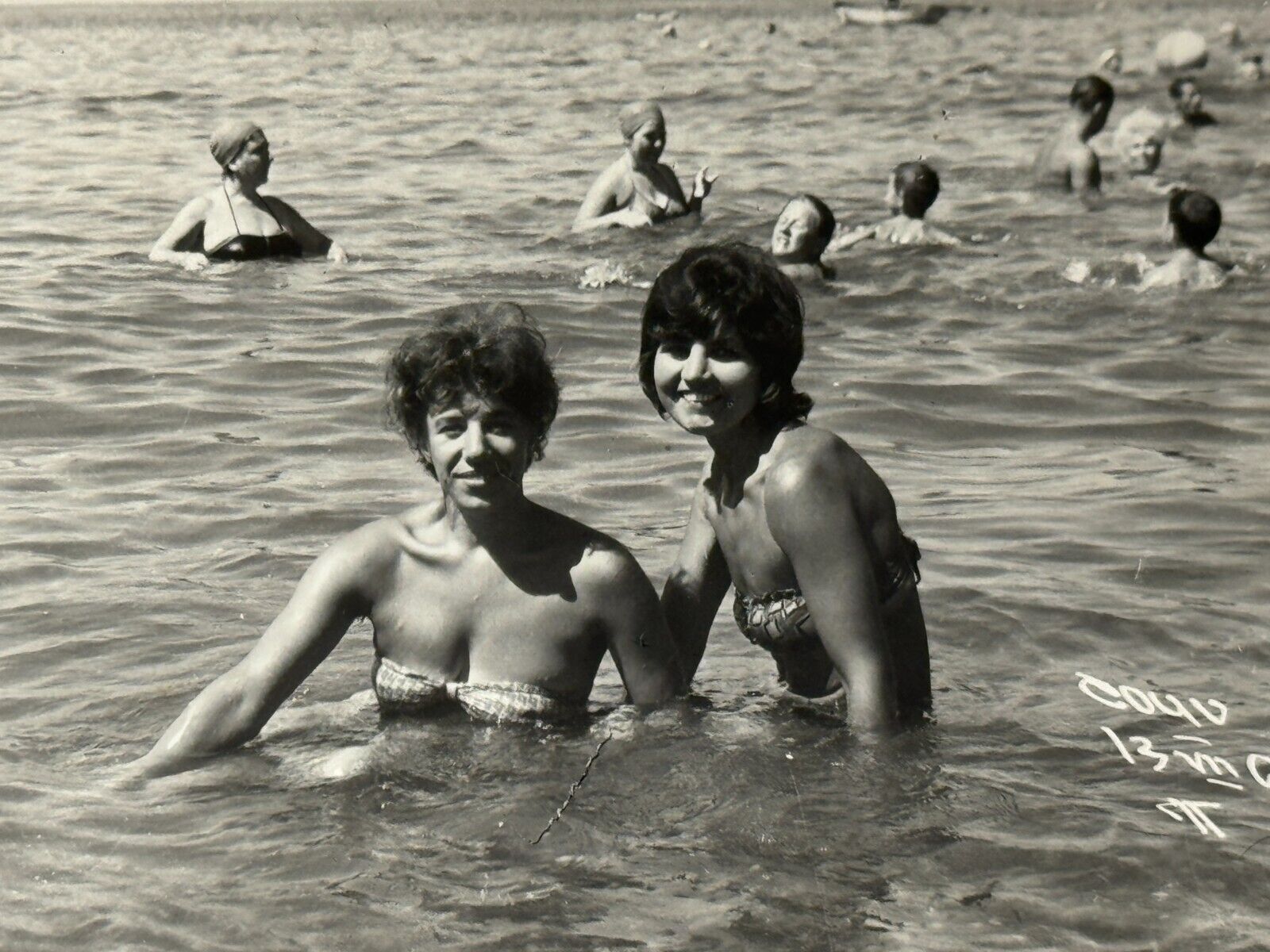 1964 Two Pretty Attractive Young Woman Bikini Sitting on Sea Beach Vintage Photo