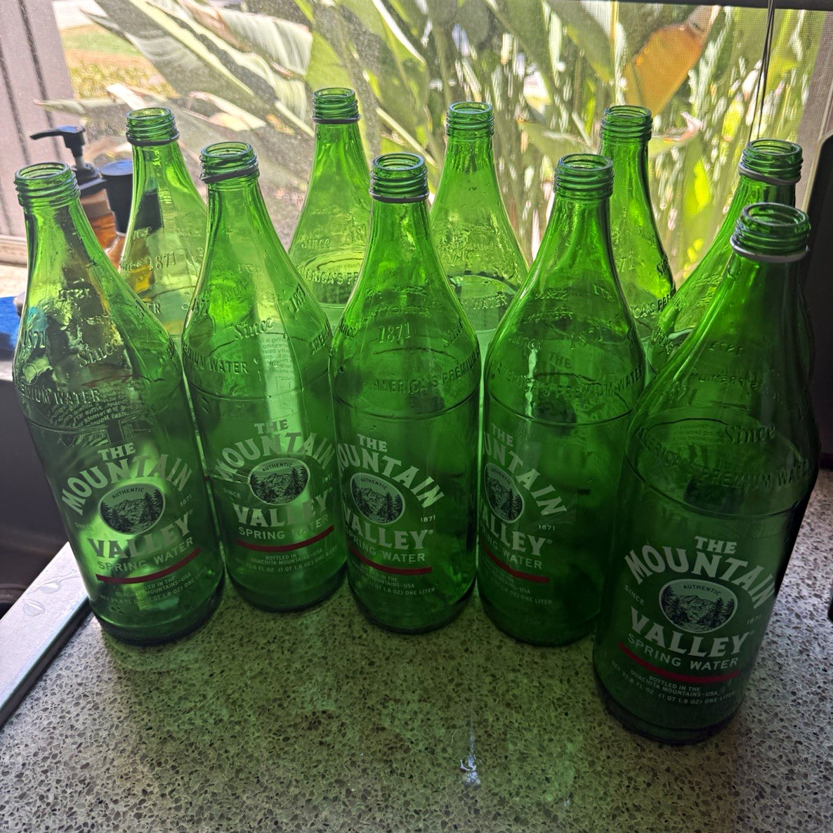 Empty Mountain Valley Spring Water Glass Bottles -1 Liter- packs of 10 or less Empty Mountain Valley Spring Water Glass Bottles -1 Liter- packs of 10 or less