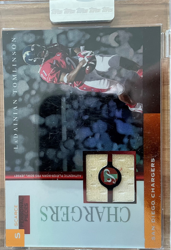 2005 LADAINIAN TOMLINSON TOPPS PRISTINE UNCIRCULATED JERSEY1/3