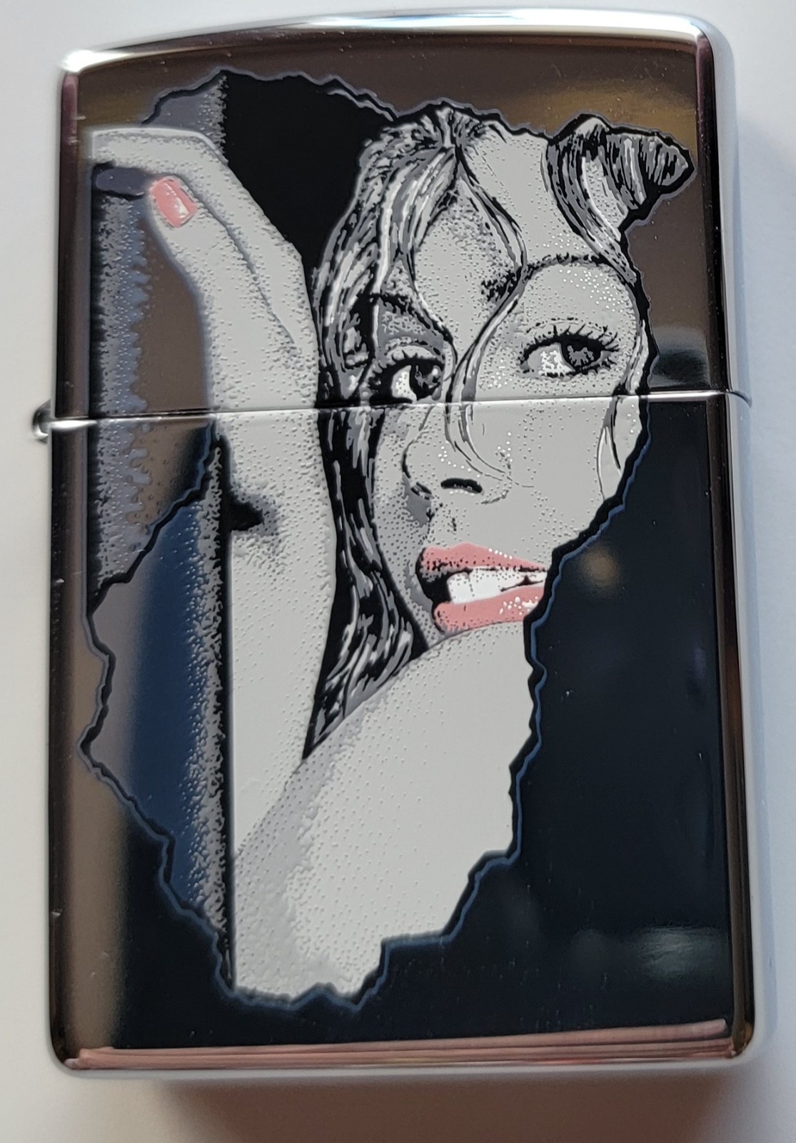 Zippo 20713 Seductive Stare High Polish New in Original case Retired 2005 Zippo 20713 Seductive Stare High Polish New in Original case Retired 2005