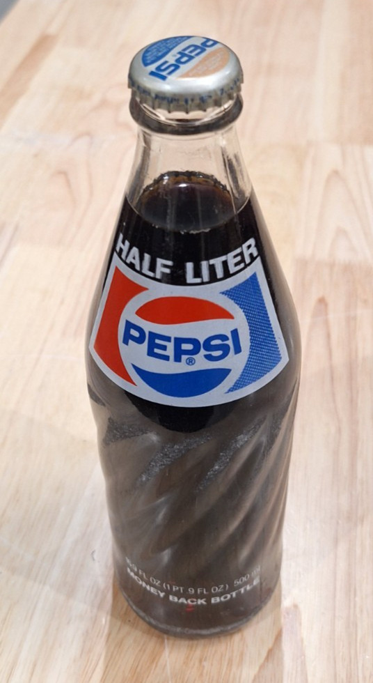 Vintage 1984 Sealed Full Unopened Pepsi-Cola Clear Glass Bottle Distinct Spiral Vintage 1984 Sealed Full Unopened Pepsi-Cola Clear Glass Bottle Distinct Spiral