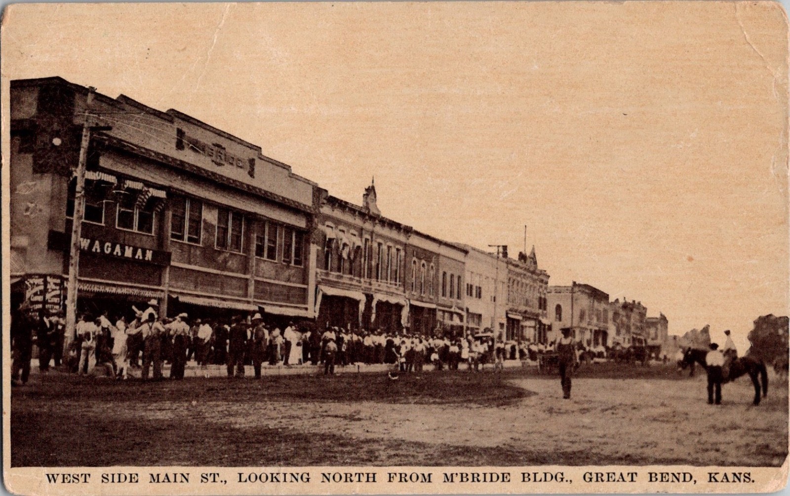 Postcard West Side Main St looking N from M’Bride Bldg, Great Bend, Kansas KS