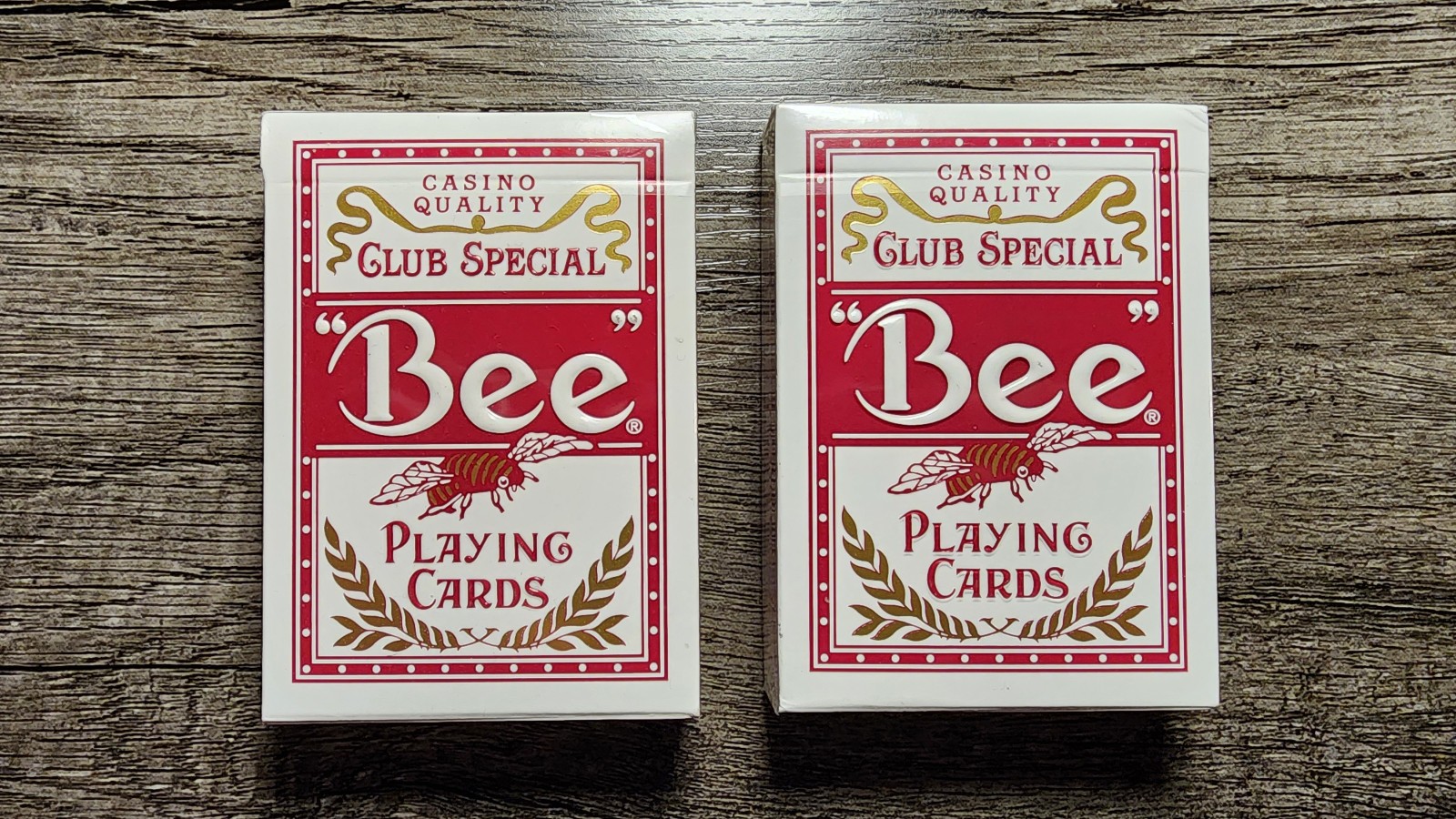Theory11 Bee Titanium Stinger Playing Cards Set of 2 Red Decks, 1 Sealed, 1 Open Theory11 Bee Titanium Stinger Playing Cards Set of 2 Red Decks, 1 Sealed, 1 Open