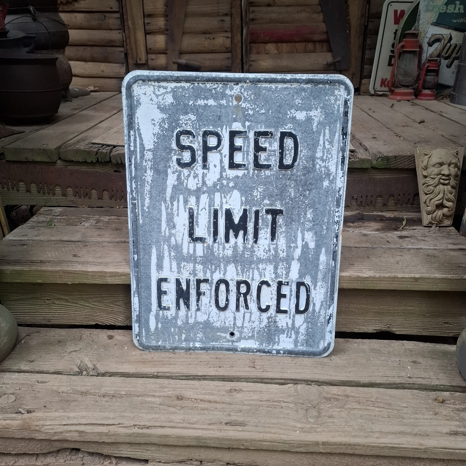 Vintage heavy metal embossed speed limit enforced street sign Vintage heavy metal embossed speed limit enforced street sign